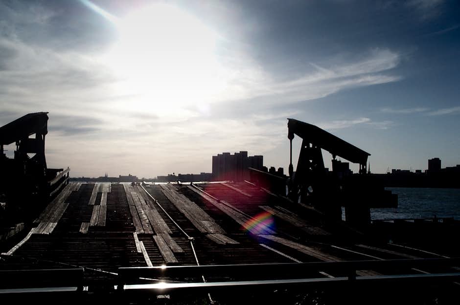 An old ship dock at Detroit River, the Sun directly pointing towards the camera An old ship dock at Detroit River, the Sun directly pointing towards the camera